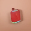 The portable, waterproof and 360-degree surround sound Bluetooth speaker with a red fabric shell Specification image